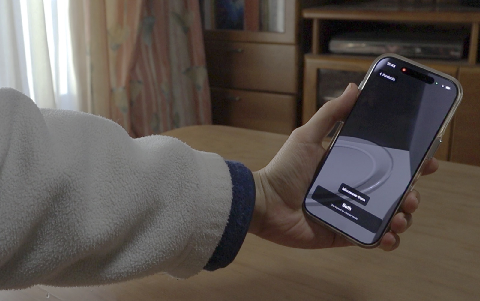 Smartphone AR app showing a microwave oven